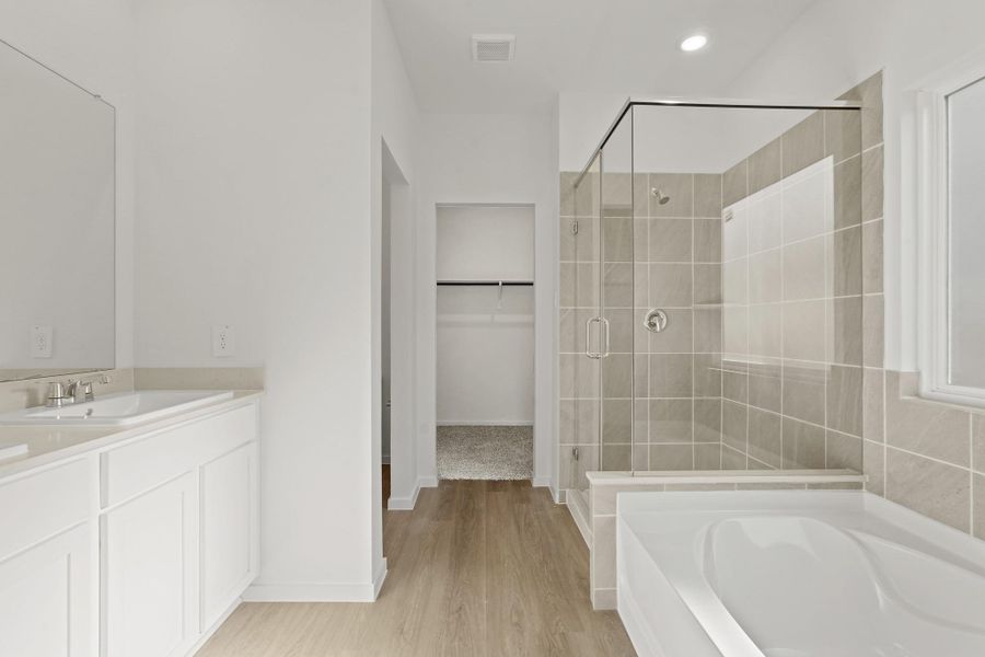 Furnished interior view inside a new home in New Waverly Station, New Waverly (Image 11).