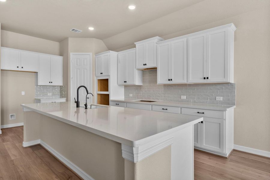 This kitchen is not only a functional space but also has ample storage. Whether you're a seasoned chef or just love to gather and enjoy good food, this kitchen is a dream come true. This kitchen is not only a functional space but also has ample storage. Whether you're a seasoned chef or just love to gather and enjoy good food, this kitchen is a dream come true.