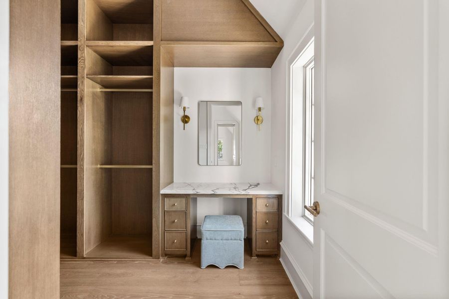 Dressing table in primary closet. Dressing table in primary closet.