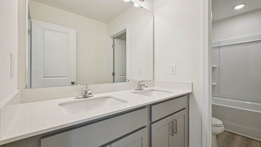 Representative furnished interior of a home built from the Wagener by DRB Homes in Station Pointe, Angier (Image 37).