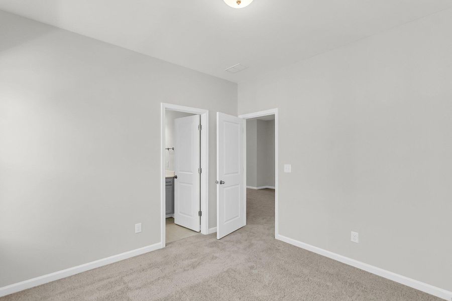 Spacious, unfurnished interior of a new home in Tidewater at Lakes of Cane Bay, Summerville (Image 20). Spacious, unfurnished interior of a new home in Tidewater at Lakes of Cane Bay, Summerville (Image 20).