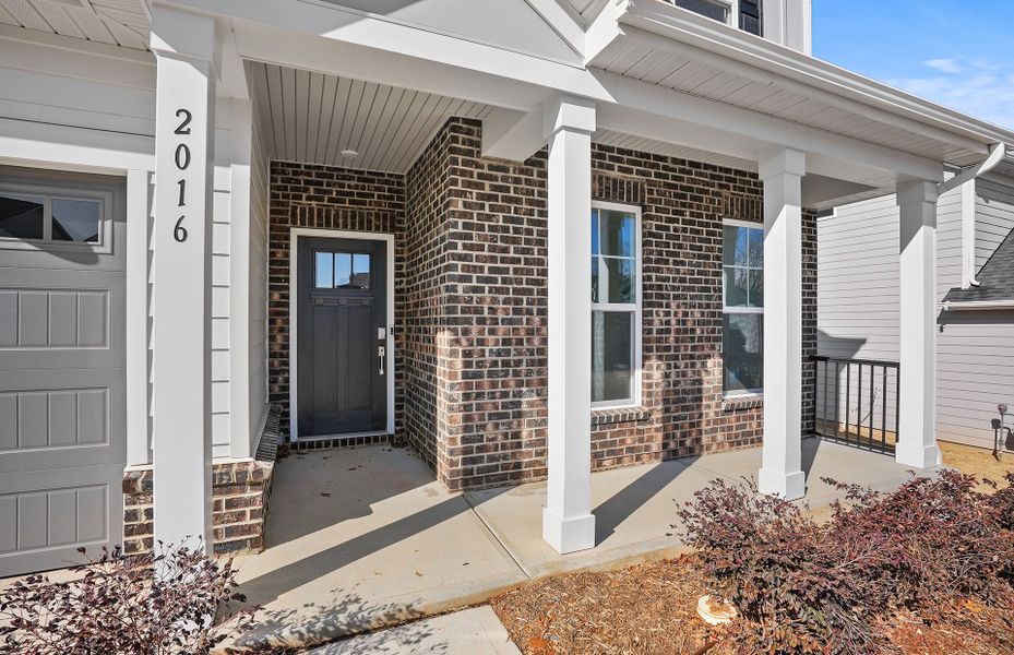Exterior details and patio area of a home in Forest Creek, Waxhaw (Image 20).