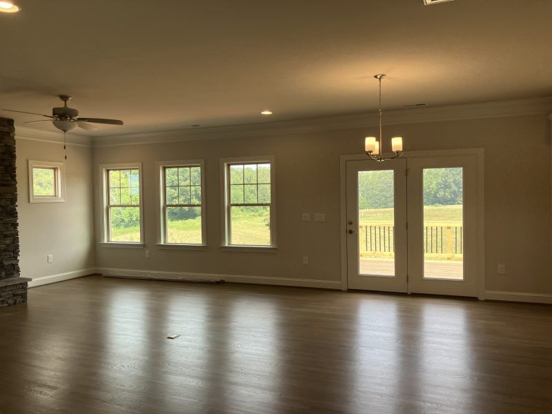 Spacious, unfurnished interior of a new home in Blacksmith, Stokesdale (Image 17).