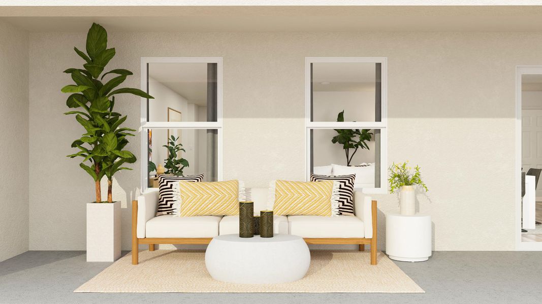 A living room with a couch and a planter. A living room with a couch and a planter.