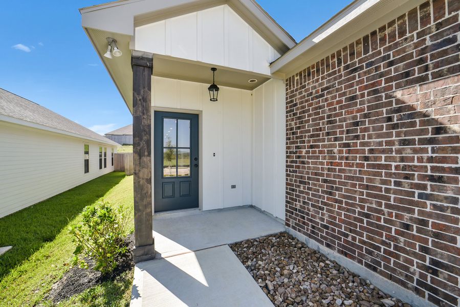 Exterior details and patio area of a home in Mostyn Springs, Magnolia (Image 3).
