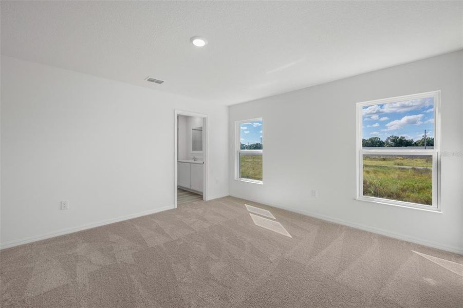 Spacious, unfurnished interior of a new home in Peach Crossings, Winter Haven (Image 17).