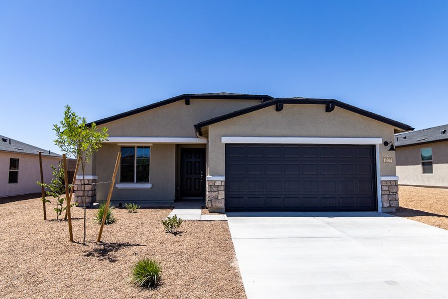 Front exterior of a new home in Perkinsville, Chino Valley, AZ, highlighting curb appeal (Image 2). Front exterior of a new home in Perkinsville, Chino Valley, AZ, highlighting curb appeal (Image 2).