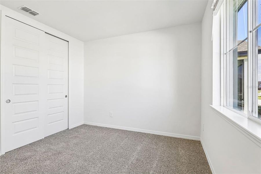 Spacious, unfurnished interior of a new home in The Grove at Stuart Crossing - Signature Series, Bartow (Image 22). Spacious, unfurnished interior of a new home in The Grove at Stuart Crossing - Signature Series, Bartow (Image 22).
