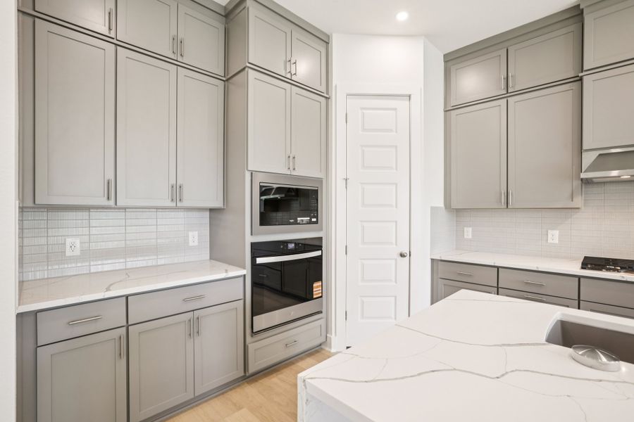 Furnished interior view inside a new home in Persimmon, Buda (Image 5).