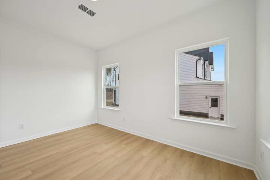 Representative unfurnished interior of a home built from the Leland by Ashton Woods in Rowland's Grant, Fuquay Varina (Image 20).
