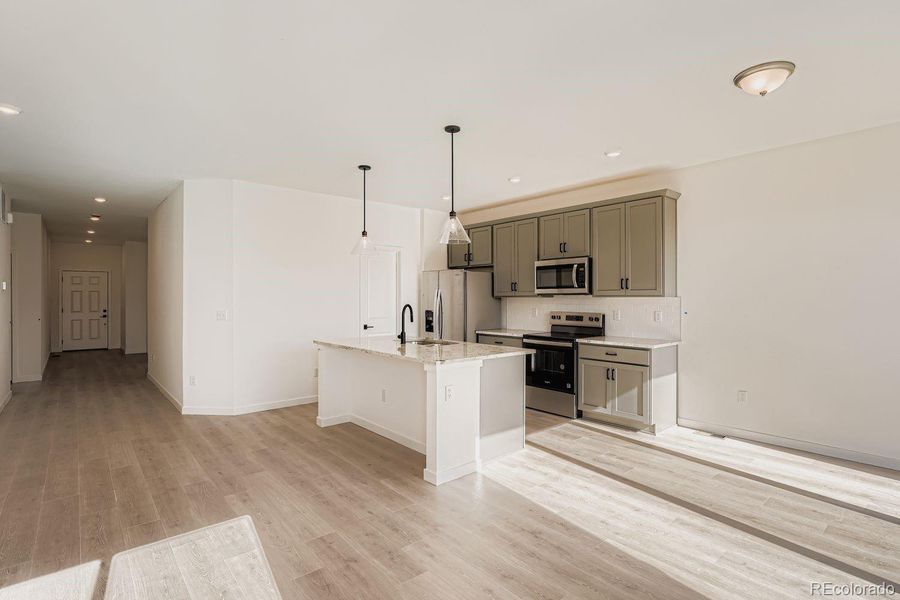 Images not from actual home, but are from same floor plan.