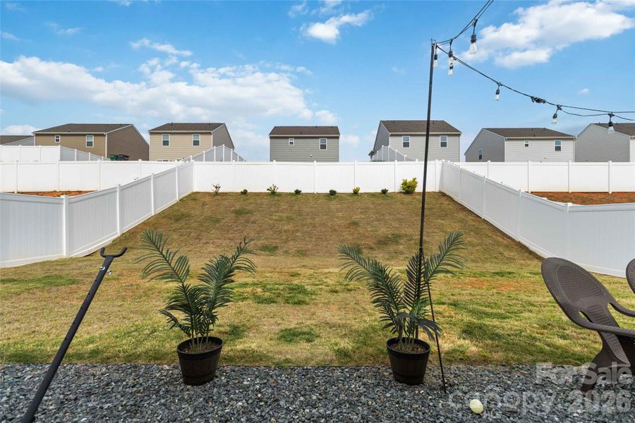 Exterior details and patio area of a home in McKee Creek Village, Charlotte (Image 23).