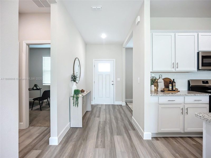 Furnished interior view inside a new home in , North Port (Image 9).