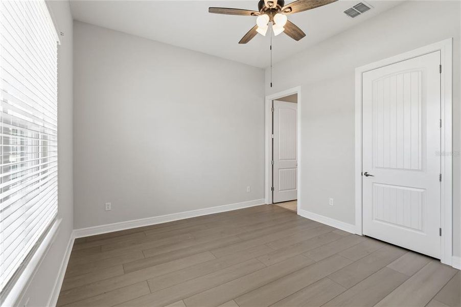 Spacious, unfurnished interior of a new home in Del Webb Sunbridge, St. Cloud (Image 25).