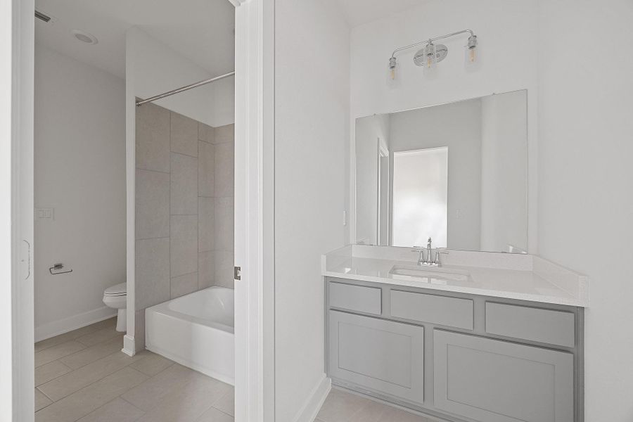 Furnished interior view inside a new home in Flora - 60', Hutto (Image 10).