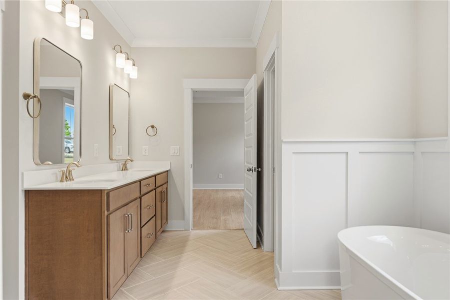 Herringbone-patterned floors lead to a sleek doubl