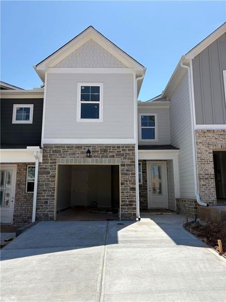Front exterior of a new home in Stegall Village, Cartersville, GA, highlighting curb appeal (Image 73).