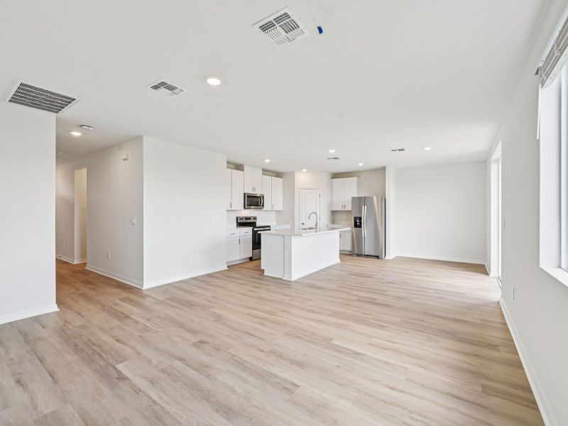 Spacious, unfurnished interior of a new home in Oakfield Trails - Premier Series, Parrish (Image 7).
