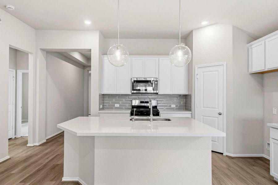 Furnished interior view inside a new home in Bridgeland, Cypress (Image 7).