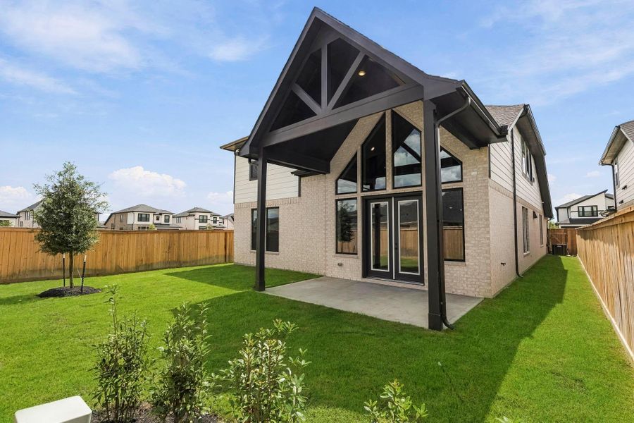 Spacious backyard comes complete with a relaxing covered patio! An ideal location to grill and relax with friends and family. Spacious backyard comes complete with a relaxing covered patio! An ideal location to grill and relax with friends and family.