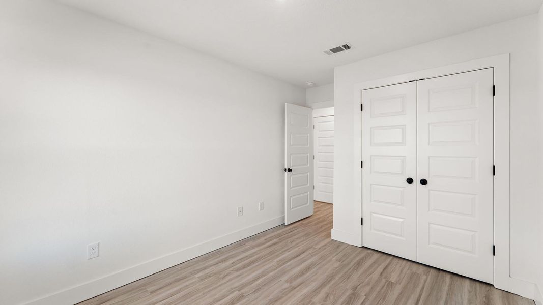Spacious, unfurnished interior of a new home in Colonial East Townhomes, Panama City Beach (Image 26).