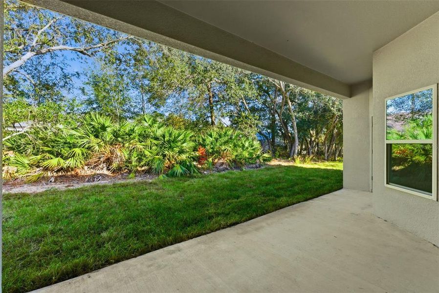 Exterior details and patio area of a home in , Citrus Springs (Image 34).