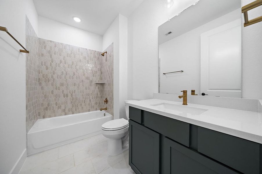 Representative furnished interior of a home built from the Cardinal by Caldwell Homes in Chambers Creek, Willis (Image 9).