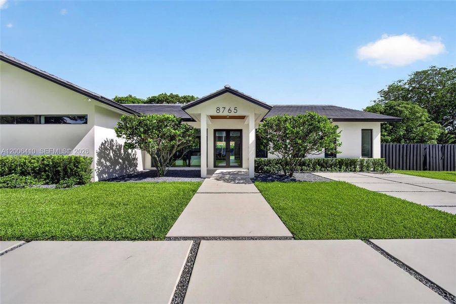 Front exterior of a new home in , Palmetto Bay, FL, highlighting curb appeal (Image 2). Front exterior of a new home in , Palmetto Bay, FL, highlighting curb appeal (Image 2).
