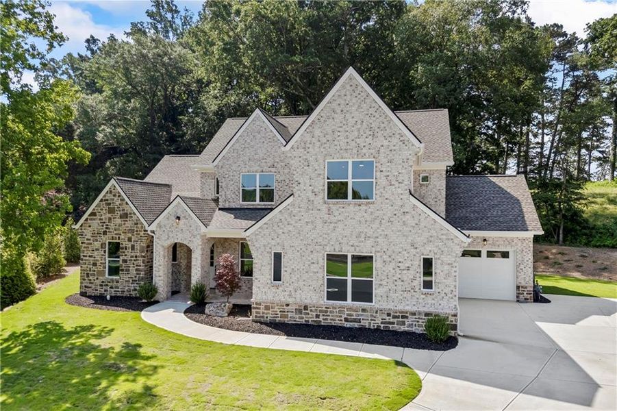 Front exterior of a new home in , Marietta, GA, highlighting curb appeal (Image 30).
