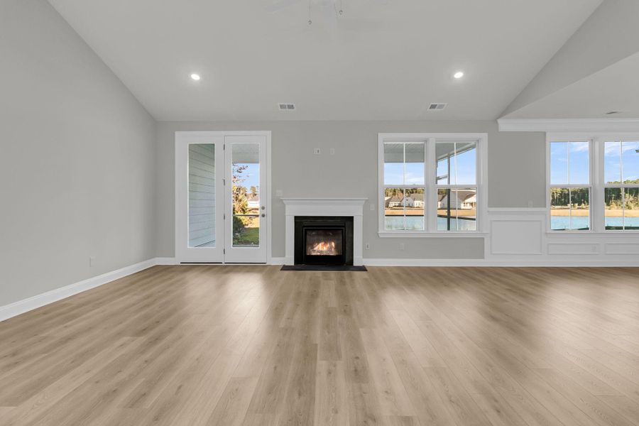 Spacious, unfurnished interior of a new home in Tidewater at Lakes of Cane Bay, Summerville (Image 24).