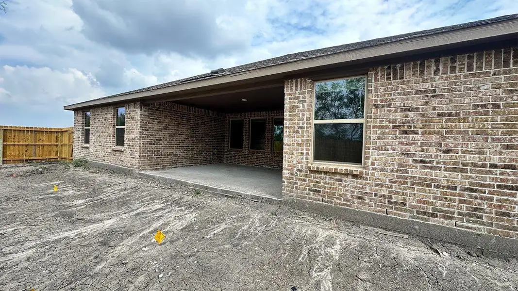 Exterior details and patio area of a home in The Lakes Northwest, Robstown (Image 3).