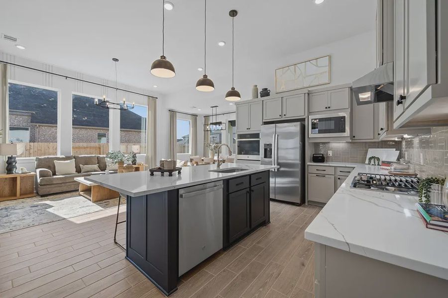 Representative furnished interior of a home built from the Bonneville by Chesmar Homes in Grange, Katy (Image 10).