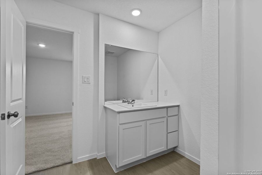 Furnished interior view inside a new home in , Floresville (Image 10).