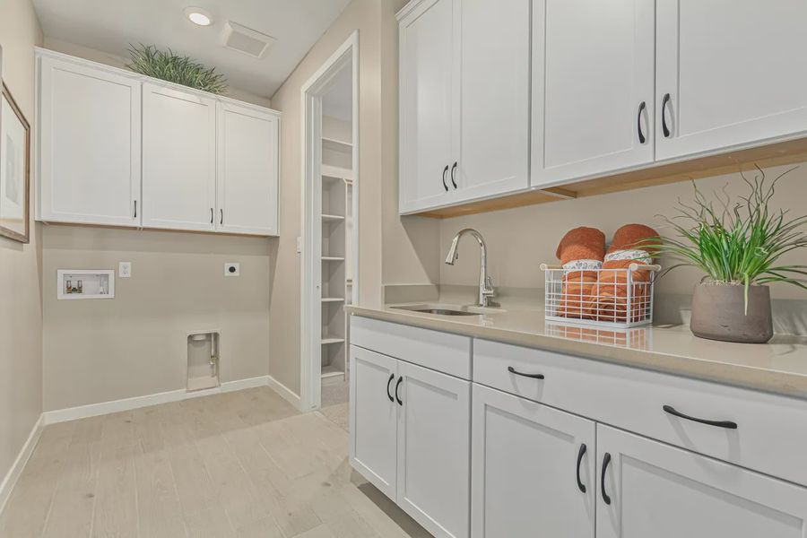 Representative furnished interior of a home built from the 2257 by Elliott Homes in Acacia at Santana, Yuma (Image 32).