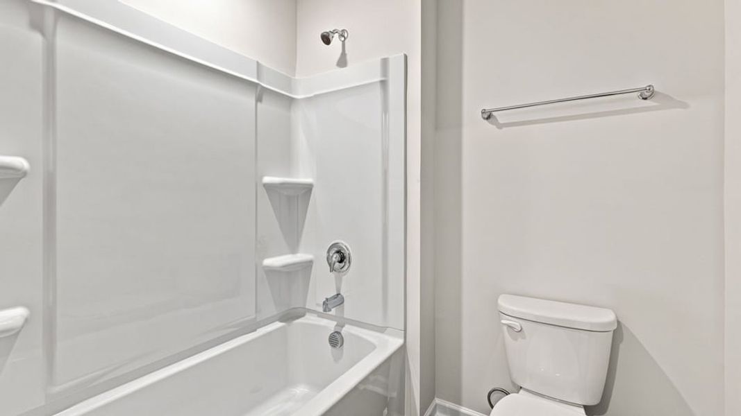 Furnished interior view inside a new home in Bentley Park, Greenwood (Image 10).
