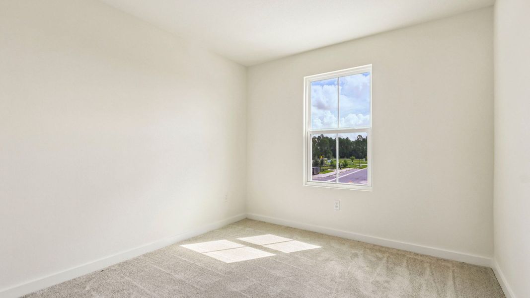 Furnished interior view inside a new home in Cyrene at Harmony, St. Cloud (Image 31).