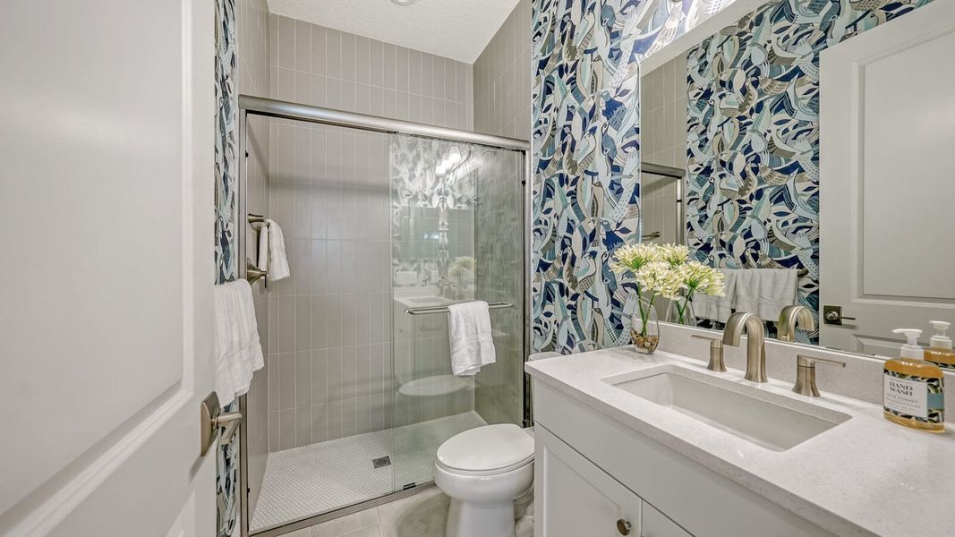 Furnished interior view inside a new home in SkySail Real Estate and Homes for Sale in Naples, FL - Neal Communities, Naples (Image 17).