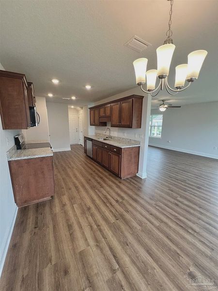 Furnished interior view inside a new home in Pine Top, Cantonment (Image 5).