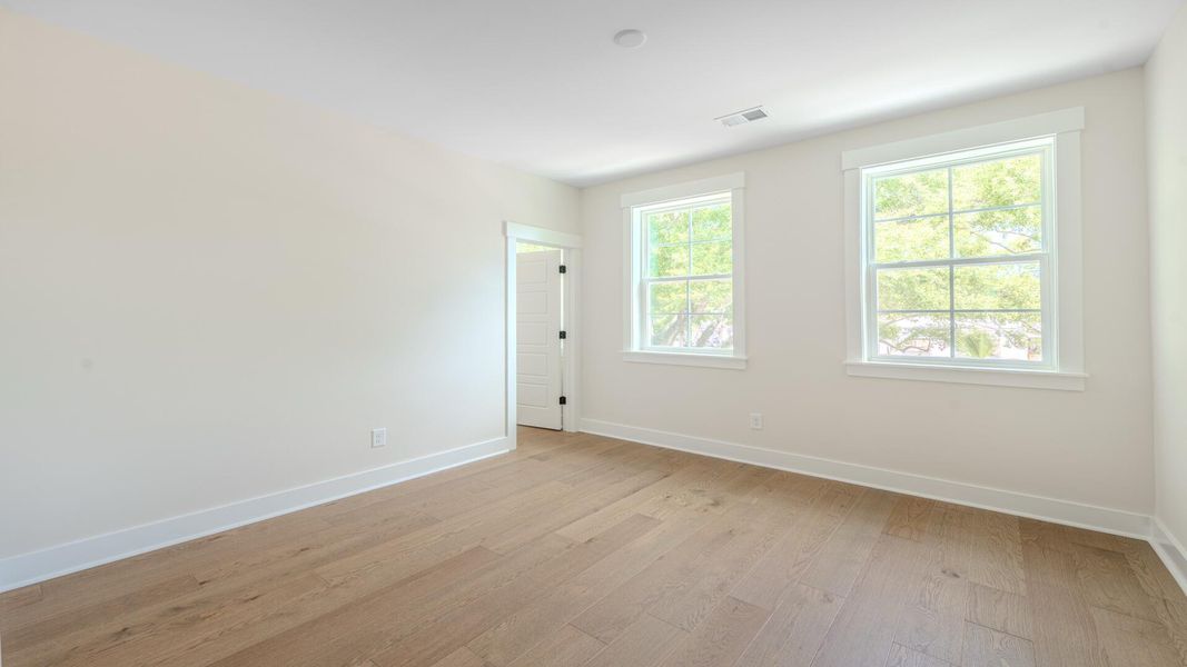 Spacious, unfurnished interior of a new home in Bayview Acres, Mount Pleasant (Image 31). Spacious, unfurnished interior of a new home in Bayview Acres, Mount Pleasant (Image 31).