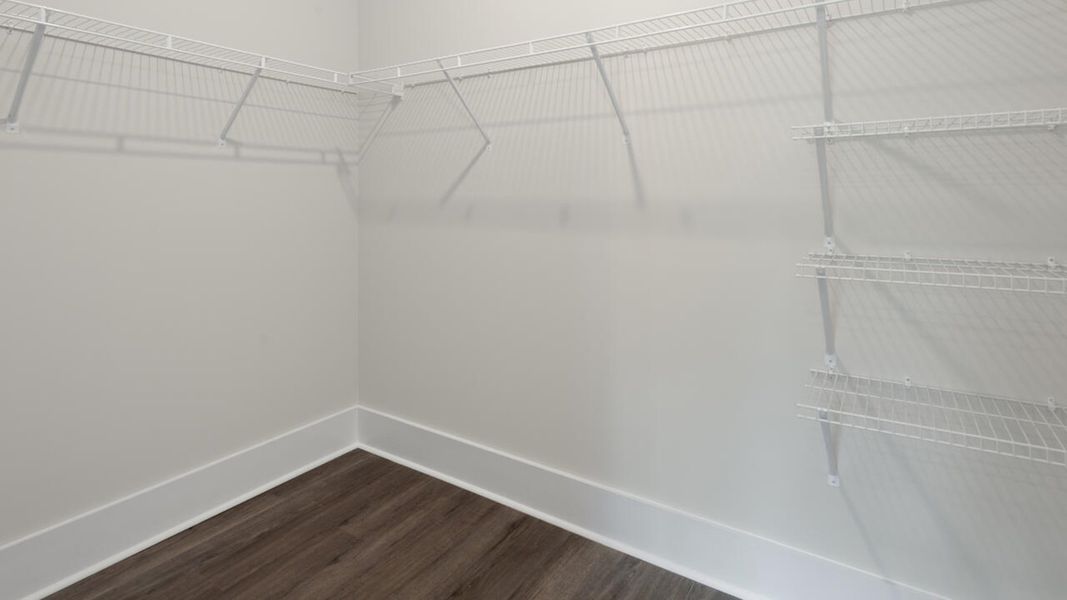 Representative unfurnished interior of a home built from the TUSCAN II by D.R. Horton in Indigo Preserve Townhomes, Leland (Image 19).