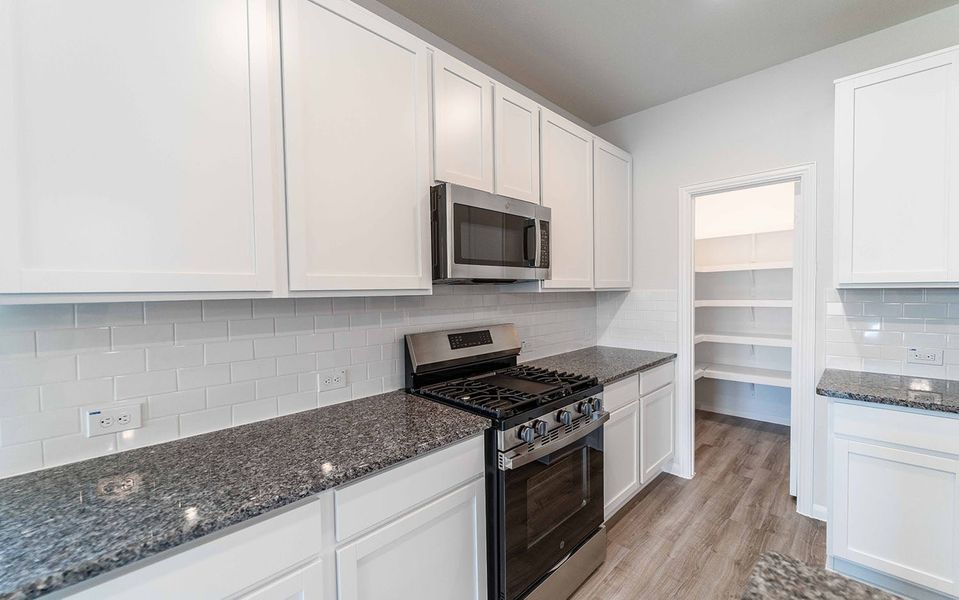 Furnished interior view inside a new home in Colony at Pinehurst, Pinehurst (Image 8).