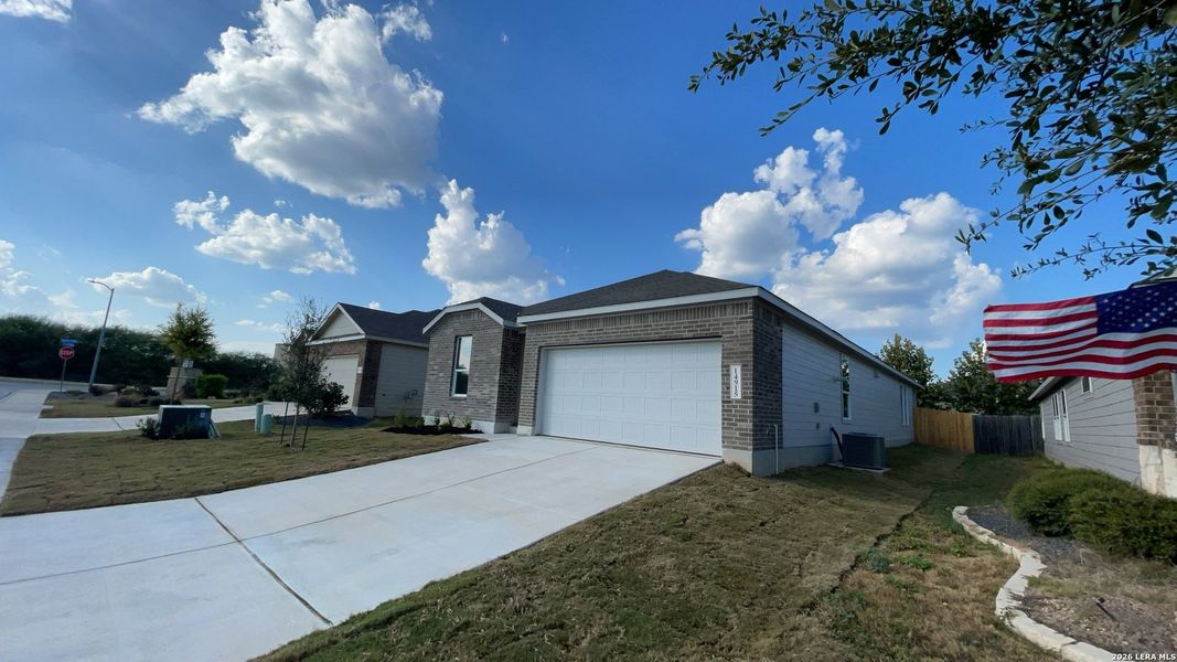 Front exterior of a new home in Waterwheel, San Antonio, TX, highlighting curb appeal (Image 19).