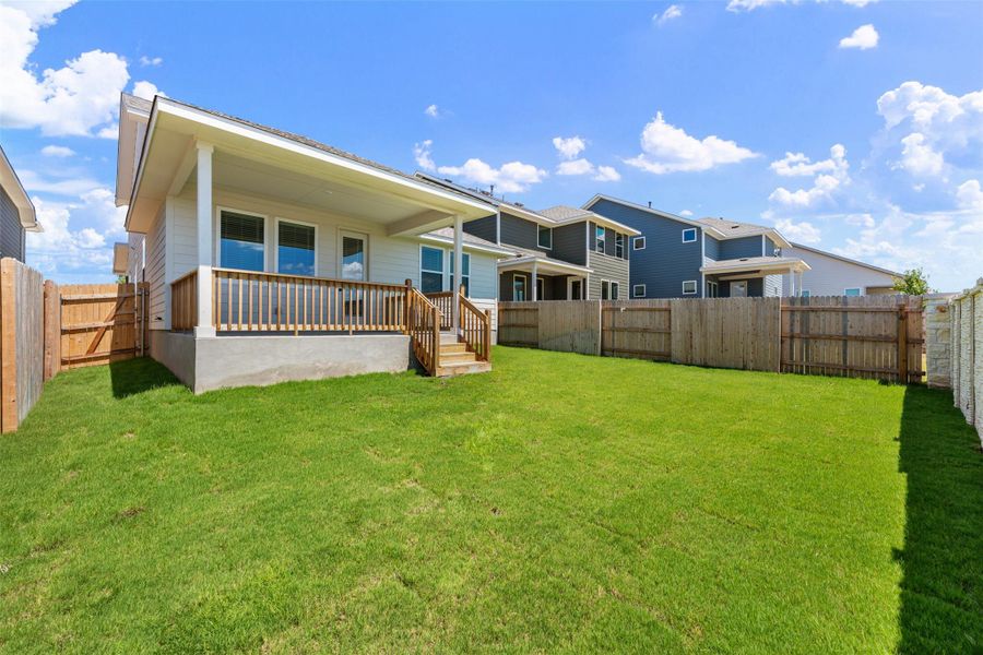 Exterior details and patio area of a home in Cannon Ranch, Dripping Springs (Image 3).