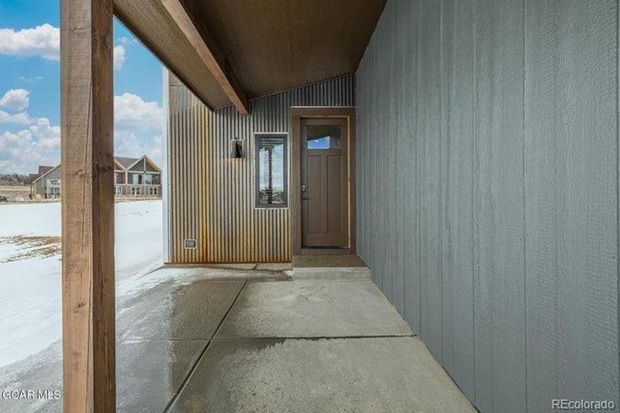 Exterior details and patio area of a home in , Granby (Image 26).