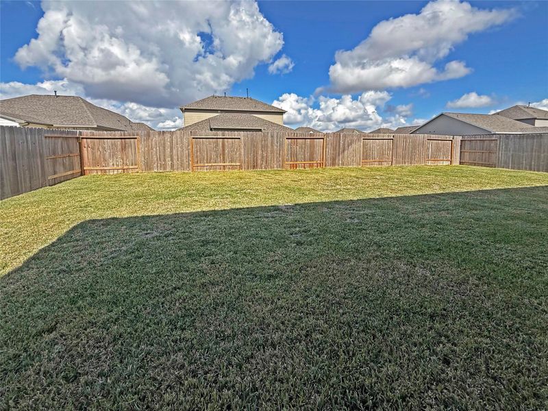 Exterior details and patio area of a home in Sierra Vista, Iowa Colony (Image 16).
