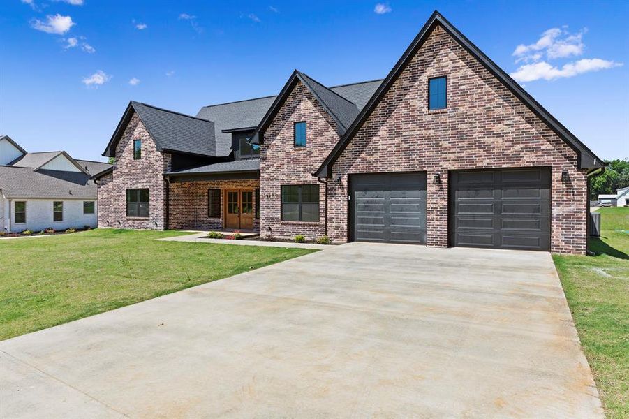 Front exterior of a new home in , Tyler, TX, highlighting curb appeal (Image 2). Front exterior of a new home in , Tyler, TX, highlighting curb appeal (Image 2).