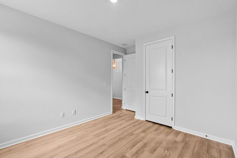 Spacious, unfurnished interior of a new home in Lilah Grove, Summerfield (Image 31).