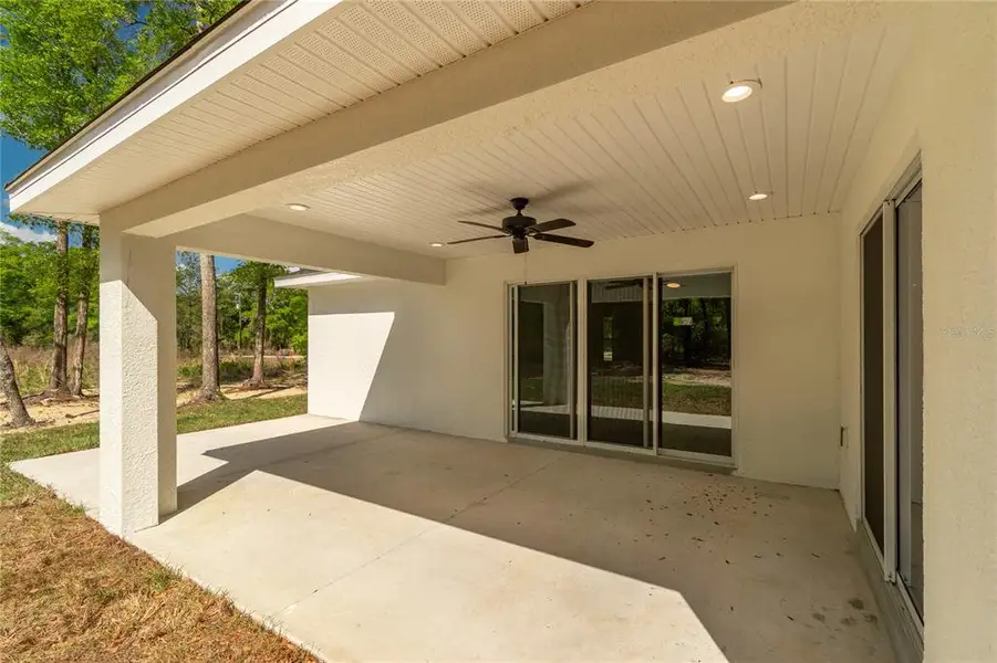 Exterior details and patio area of a home in , Ocala (Image 32).
