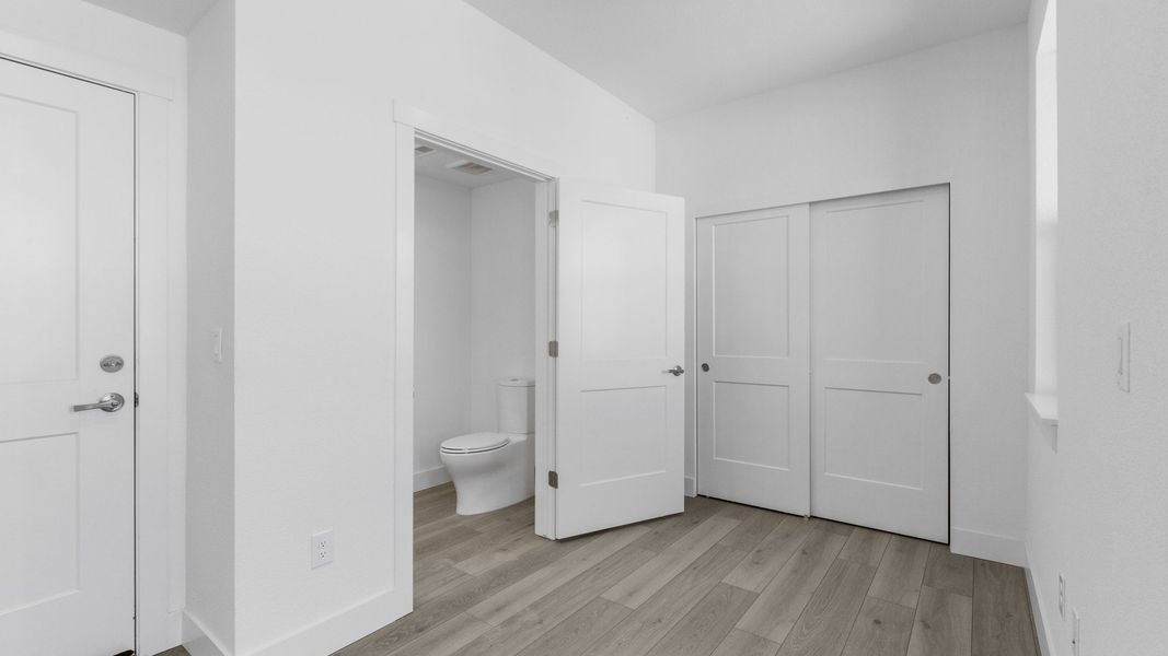 Furnished interior view inside a new home in Dillon Pointe - Skyview, Broomfield (Image 13).