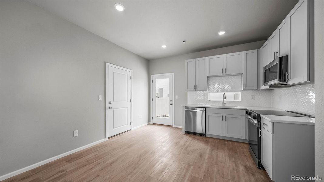 Furnished interior view inside a new home in Thompson River Ranch, Johnstown (Image 6).